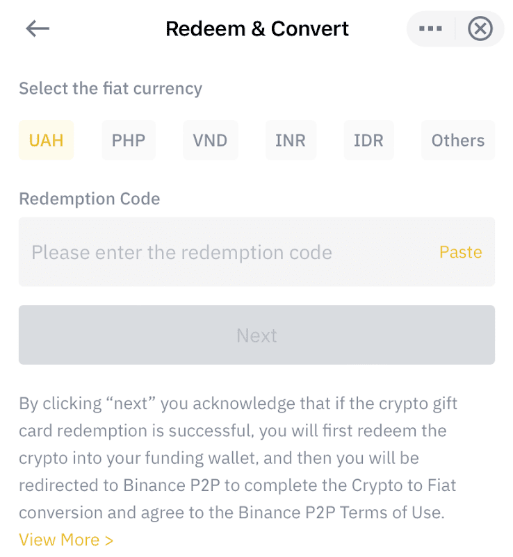 Select the fiat currency, enter the redemption code and click [Next]